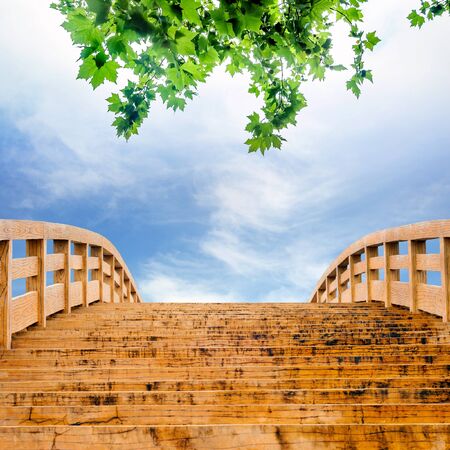 Wooden bridge in the sky backgroundの写真素材