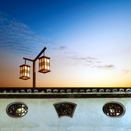 Chinese classical architectural elements  walls and street lightsの写真素材