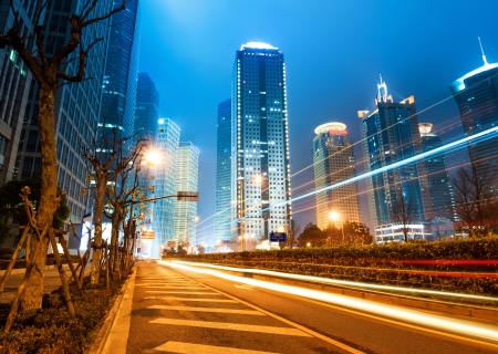 Shanghai Lujiazui Finance and Trade Zone of the modern city night backgroundの写真素材