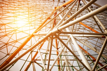 ferris wheel against a blue skyの写真素材