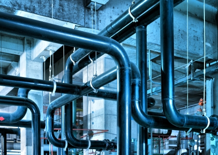 Equipment, cables and piping as found inside of industrial power plantの写真素材