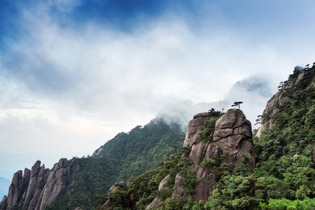 Mist-shrouded mountains, geological wonders の写真素材