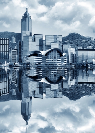 Hong Kong business center with a clear blue skyの写真素材