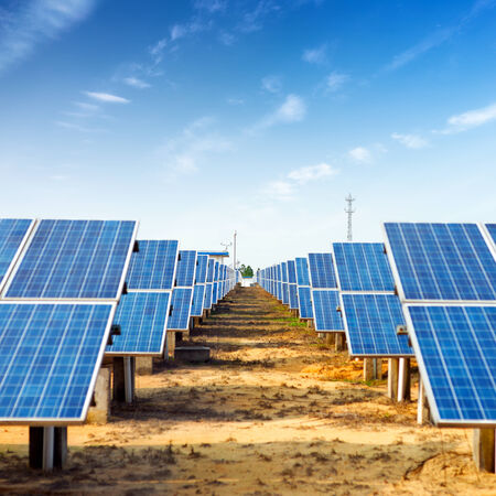 Solar panels against blue skyの写真素材