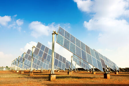Solar panels against blue skyの写真素材