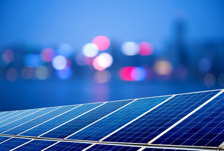 Urban landscape as the background of the solar panelの写真素材