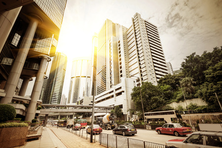 Chinese streets of Hong Kong steady stream of cars and skyscrapersのeditorial素材