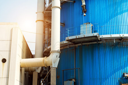 Equipment, cables and piping as found inside of industrial power plantの写真素材