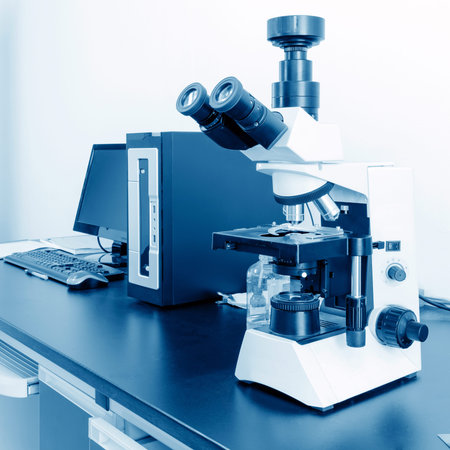 Microscope isolated against white background