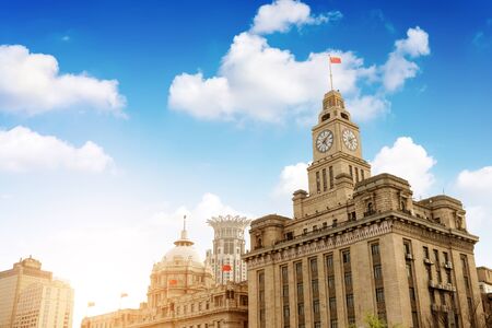 Old Customs Building with Clock and Flag, The Bund, Shanghai, China. The Customs Building was built in 1927.のeditorial素材