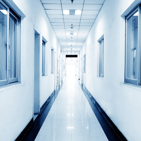 blue tone of long corridor in hospital.のeditorial素材