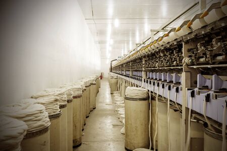 Closeup of machinery part at spinning factoryのeditorial素材