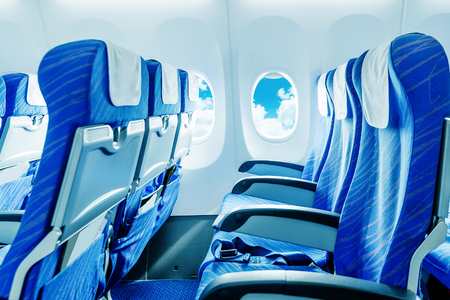 Empty aircraft seats and windows.のeditorial素材