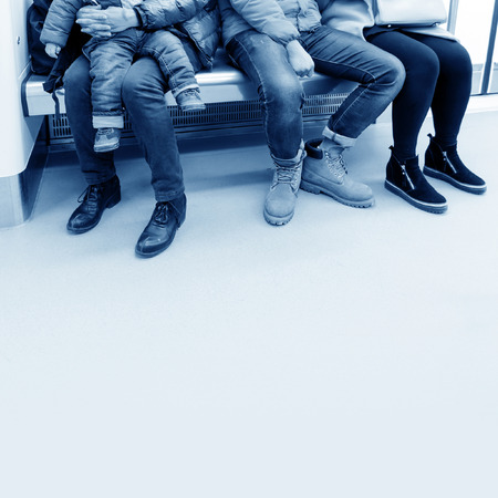 adults with children inside a trainの写真素材