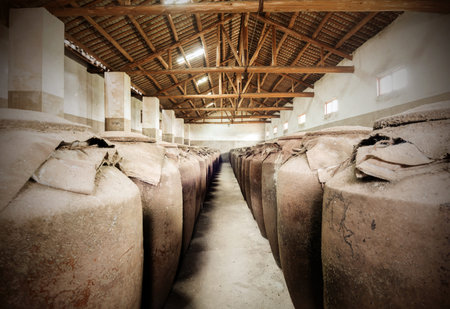 Shanghai, Jugs of distilled rice liquor at Sanbai Wine Workshop in Wuzhen historic scenic town.