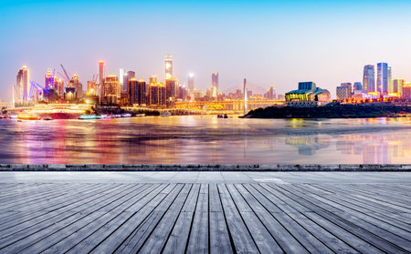 cityscape and skyline of downtown near water of chongqing at nightのeditorial素材