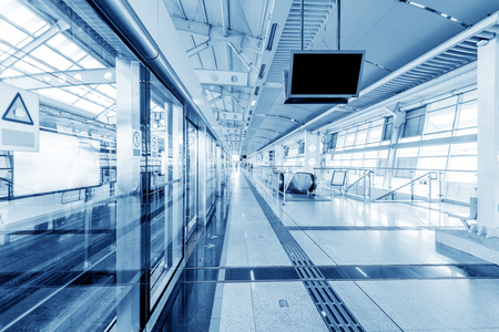 train fast moving at subway station,Shenzhen, Chinaのeditorial素材