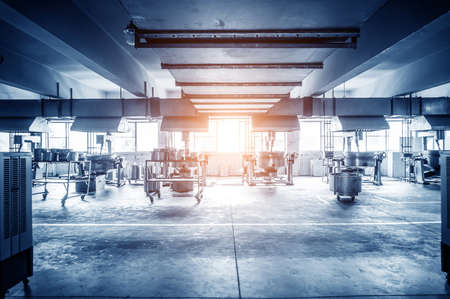 Automatic production line in the factory packing workshop, blue tint map.のeditorial素材