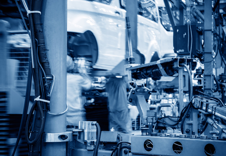 Car production line, skilled workers are working tense.の写真素材