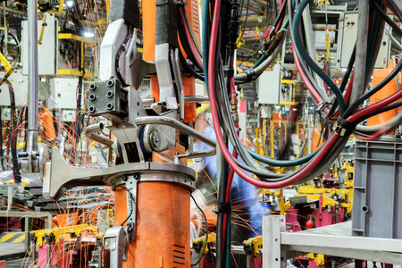 Car production line, skilled workers are working tense.の写真素材