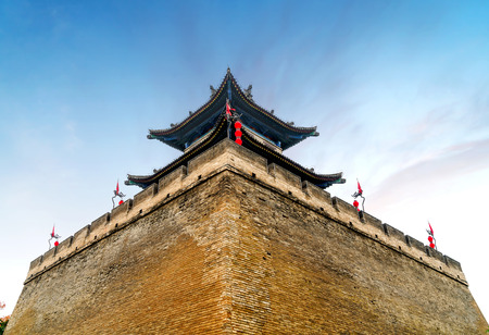 Ancient city walls in Xi'an, China, landscape at dusk.のeditorial素材