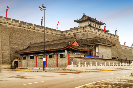 Ancient city walls in Xi'an, China, landscape at dusk.の写真素材