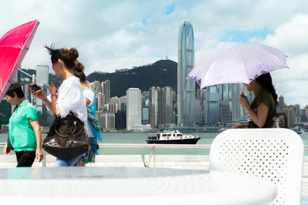 HONG KONG, CHINA - JULY. 23:Travelers visiting the Tsim Sha Tsui Promenade (Avenue of the Stars) on...