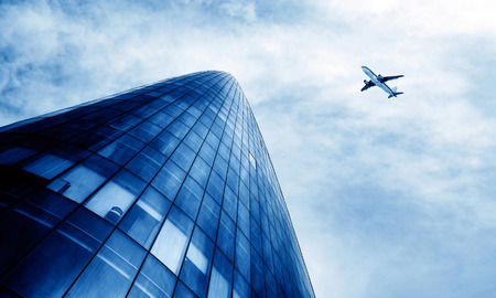 Shanghai's skyscrapers and airplanes on skyのeditorial素材