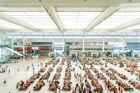 HANGHAI CHINA - JUNE 10, 2013:  people travel at Shanghai Hongqiao train stationのeditorial素材