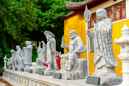 The Buddha statue in front of the temple, the legendary Eighteen Arhats.の写真素材