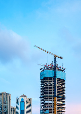 Building construction site, tall skyscrapers and cranes.の写真素材