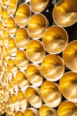 Neatly arranged copper decorative backgroundの写真素材