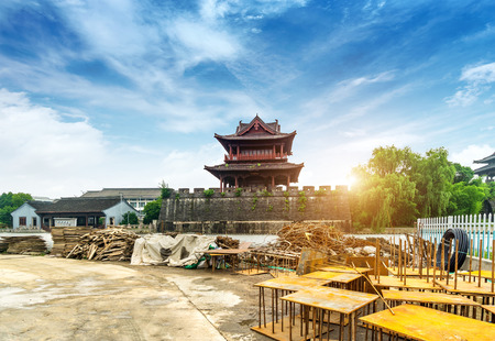 Construction site, the ancient city wall is being repaired, Shaoxing, Zhejiang, China.Translation:"Concentric, accumulate strength"のeditorial素材