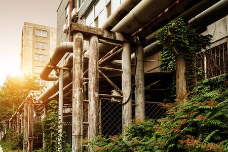 Pipes located in industrial areas, densely on the side of the road.の写真素材