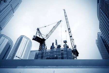Building construction site, tall skyscrapers and cranes.の写真素材