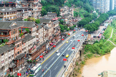 CHONGQING,CHINA-OCTOBER 15,2019: Hongyadong complex in the shape of a large ancient building. Inside, there are shops, restaurants, hotels, souvenir shops, etc. And good view pointのeditorial素材