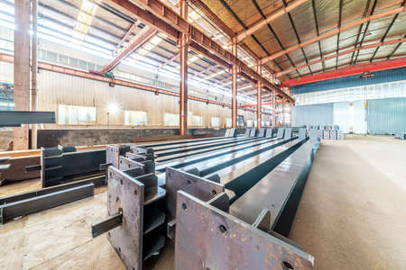 Steel factory floor, stacked with a lot of steelの写真素材