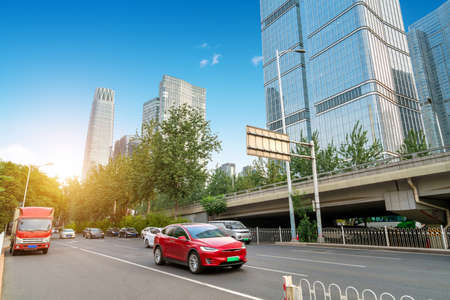 The city's tall buildings and high-speed cars, the urban landscape of Beijing, China.の写真素材