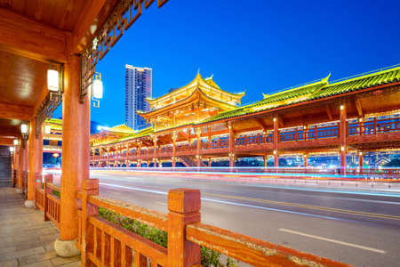 A bridge with ethnic characteristics, the night view of Duyun, Guizhou, China.の写真素材