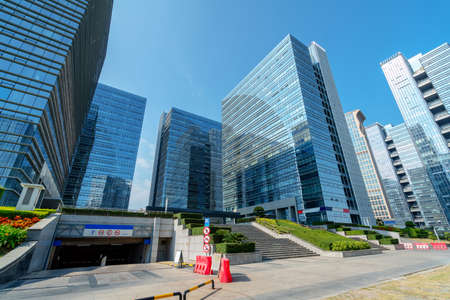 Plaza and modern skyscrapers, Xiamen CBD, Fujian, China.の写真素材