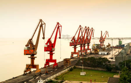 Large cranes in the harbor and seasideの写真素材