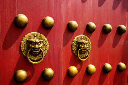 Red gates and historic buildings, Beijing, China.の写真素材