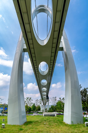 Light rail train on viaduct, Wuhan, China.の写真素材