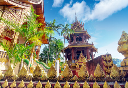 figure of Buddha and Buddhist palace in Xishuangbanna,Chinaの写真素材