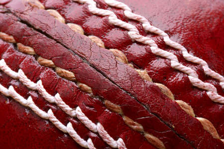 Close up shot of a red cricket ballの写真素材