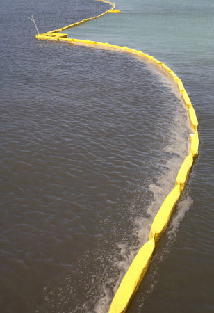 Pollution control barrier in the sea viewed from the city pier Anna maria island florida united states usa taken in march 2006の写真素材
