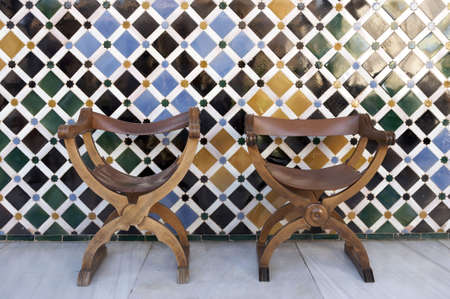 empty chairs in the patio de comares palacios nazaries alhambra palace granada spain andalucia taken in august 2006の写真素材