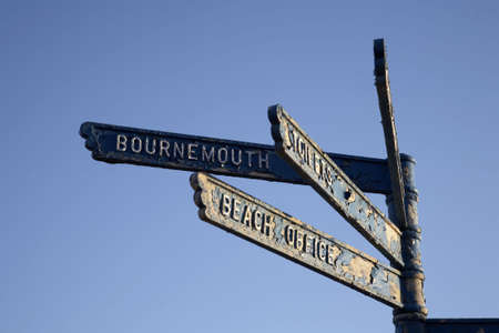 sign post on the beach at alum chine pointing towards bournemouth dorset england uk taken in february 200の写真素材