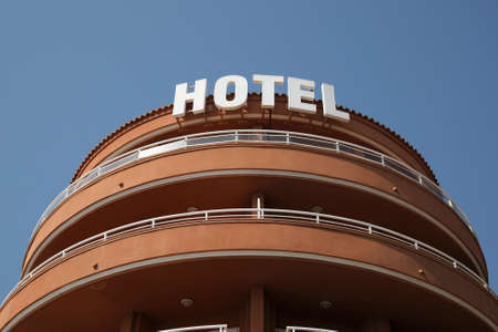 top of a hotel against a blue skyの写真素材