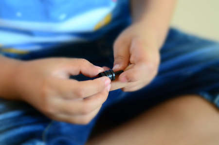 Abstract blur child playing constructions toy on the floorの写真素材